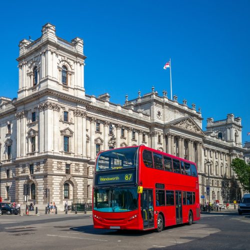 street view of london with double decker bus